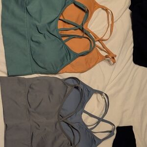Set of Four Strappy Sports Bras in Green, Orange,Blue and Gray